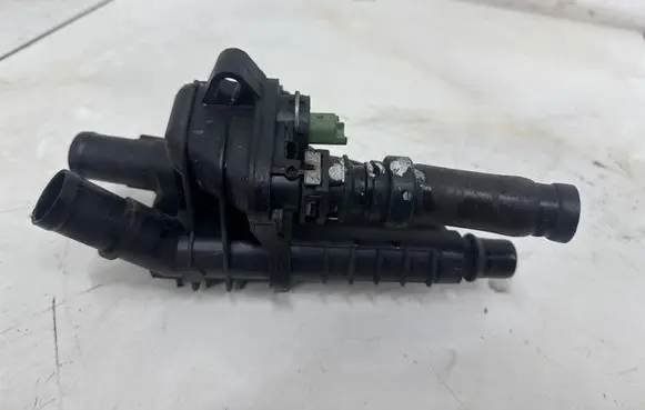 Thermostat/thermostat housing