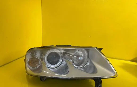 Volkswagen Touareg I Headlight/headlamp 7L6941016