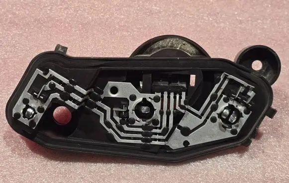 Tail light bulb cover holder
