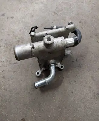Thermostat/thermostat housing