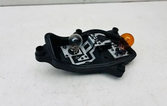Volkswagen Touran II Tail light bulb cover holder 176405