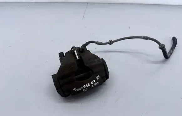 Volkswagen Touareg I Front brake caliper 7L6105AN 767H005