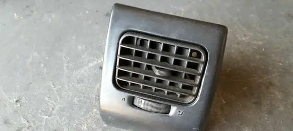 Volkswagen Golf III Dash center air vent grill 1H6819704