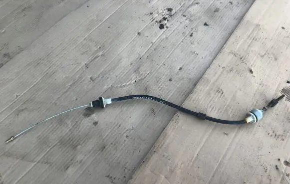 Opel Corsa B Clutch cable 90522447