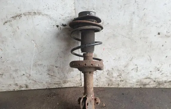 Subaru Impreza III Front shock absorber with coil spring 20310FG010