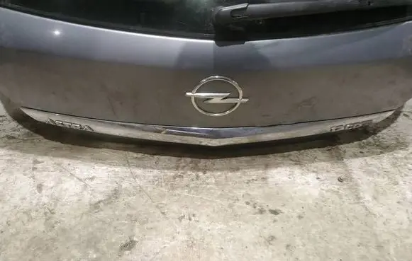 Opel Astra H Trunk door license plate light bar 
