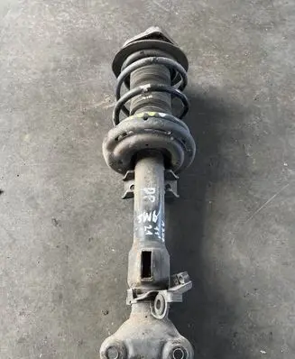 Mercedes-Benz E A207 Front shock absorber with coil spring A2073204138 2073204138