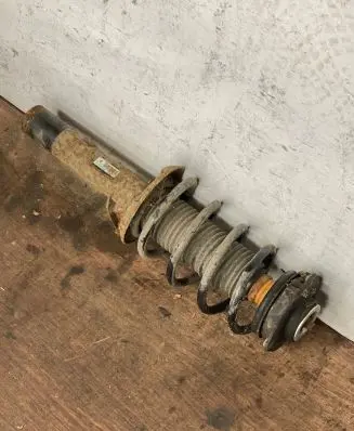 Skoda Octavia Mk2 (1Z) Front shock absorber with coil spring 1t0413031
