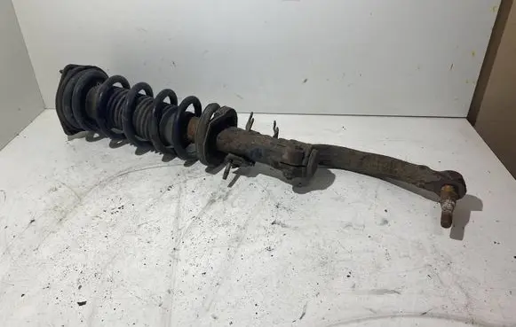 Infiniti G35 Front shock absorber with coil spring