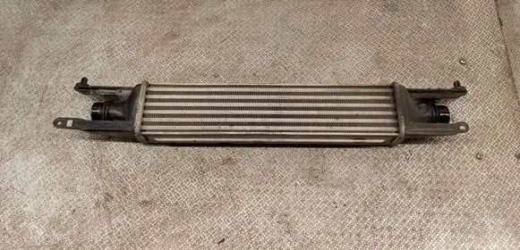 Opel Corsa D Intercooler radiator 440926702