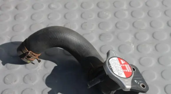Engine coolant pipe/hose