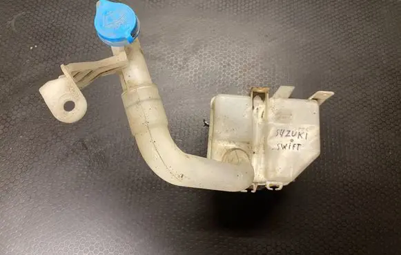 Suzuki Swift I Lamp washer fluid tank 