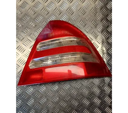 Tail light bulb cover holder