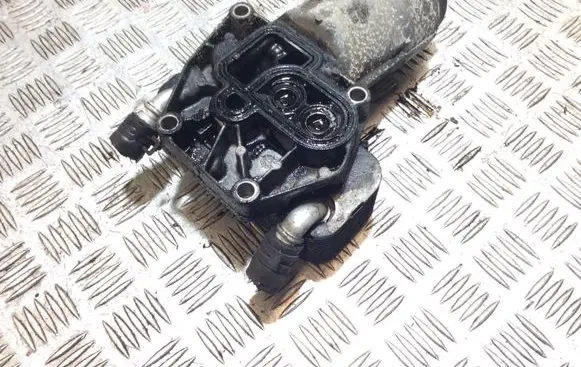 Saab 9-5 Oil filter mounting bracket 90571672