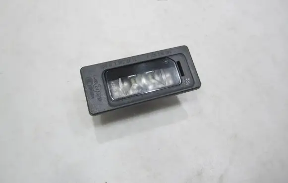 Volkswagen PASSAT B7 Number plate light 3AF943021A