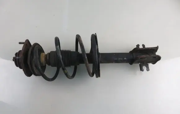 Front shock absorber with coil spring