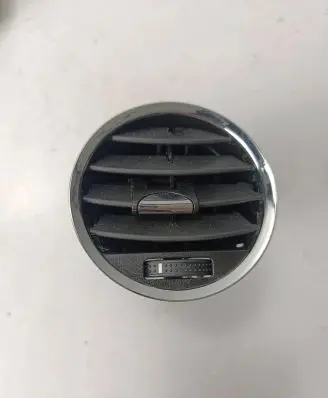 Dash center air vent grill