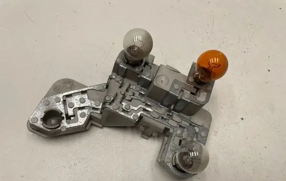 Volvo V50 Tail light bulb cover holder 27168008