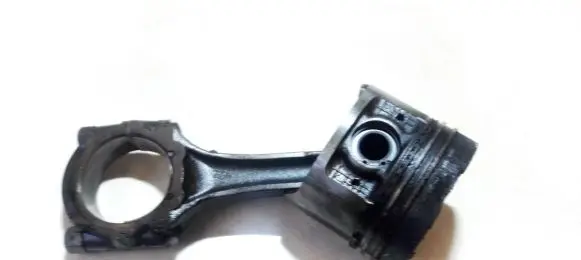 Nissan Almera Piston with connecting rod 12157j2