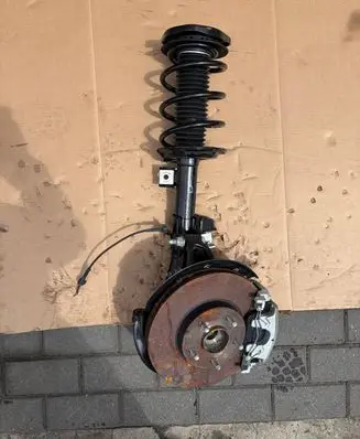 Ford Focus Front shock absorber with coil spring JX6118045XEG