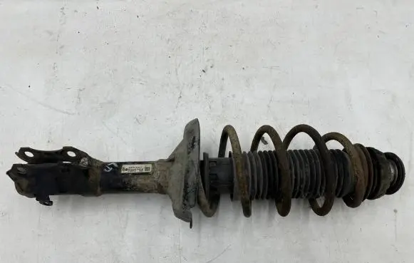 Front shock absorber with coil spring