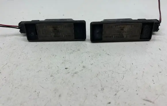 Nissan Primera Number plate light 2KA008224