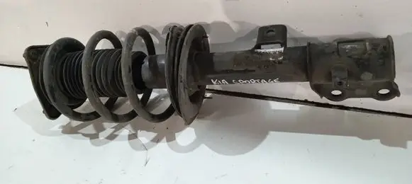 KIA Sportage Front shock absorber with coil spring 546503U550