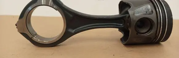 Piston with connecting rod