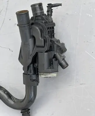Thermostat/thermostat housing