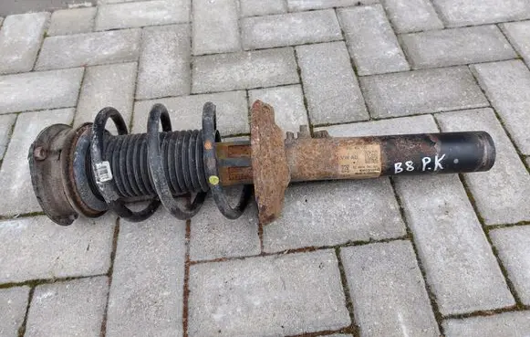 Volkswagen PASSAT B8 Front shock absorber with coil spring 3Q0413031CC