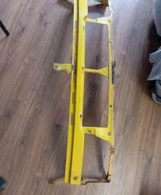 Radiator support slam panel