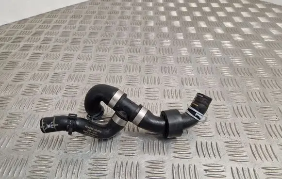 Volkswagen Golf VII Engine coolant pipe/hose 04L122073B