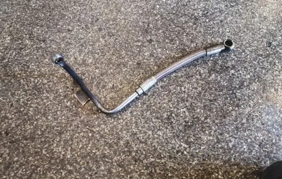 Opel Zafira B Turbo turbocharger oiling pipe/hose 73503216