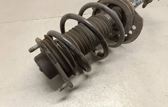 Front shock absorber with coil spring