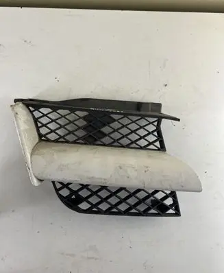 Mitsubishi Outlander Front bumper upper radiator grill MB7A42AR
