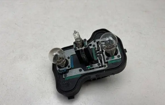 Volkswagen Golf V Tail light bulb cover holder 89031796