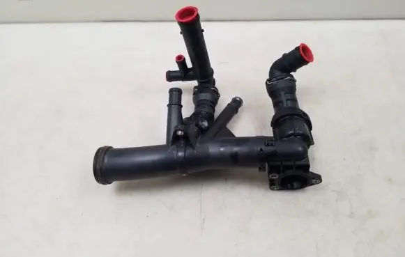 Thermostat/thermostat housing