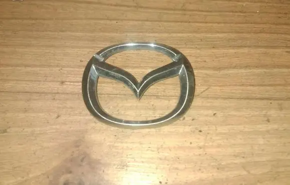 Mazda 323 F Manufacturer badge logo/emblem 