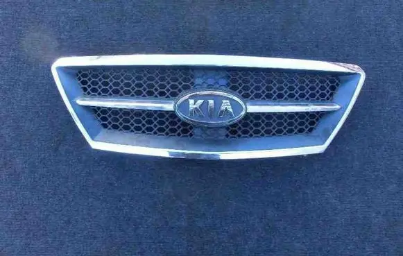 KIA Sorento Front bumper upper radiator grill 863503E010