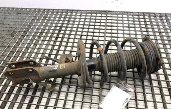 Nissan Leaf I (ZE0) Front shock absorber/damper