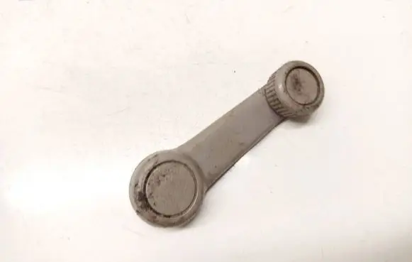 Mazda Demio Front door window winding handle 