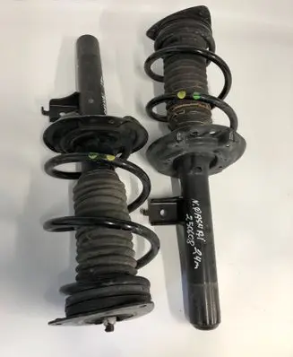 Nissan Qashqai J12 Front shock absorber with coil spring 543036um2a