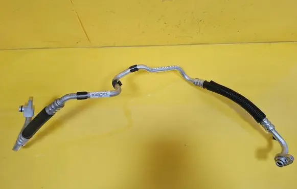 Chrysler Voyager Air conditioning (A/C) pipe/hose 05005220AC