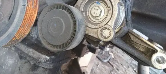 Generator/alternator belt tensioner