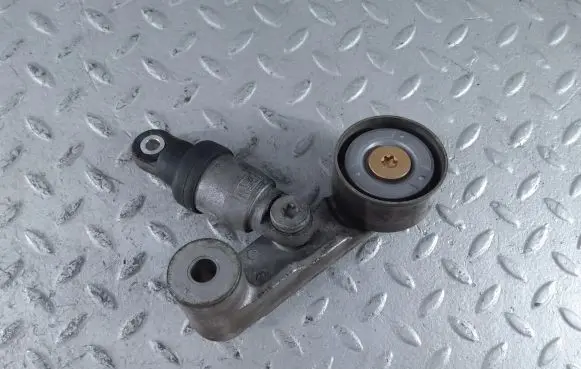 Suzuki Swift III Alternator belt tensioner 1754081PA0