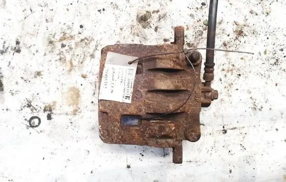 Subaru Legacy Front brake caliper tokico