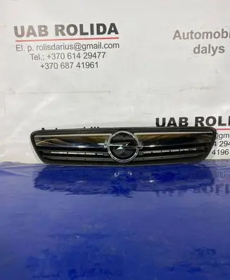 Opel Meriva A Front bumper upper radiator grill 13207140