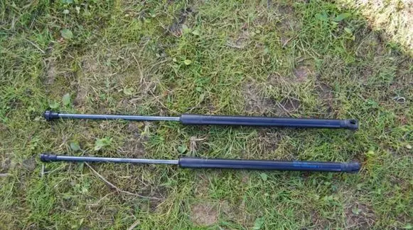 Volkswagen Golf V Tailgate/trunk/boot tension spring 
