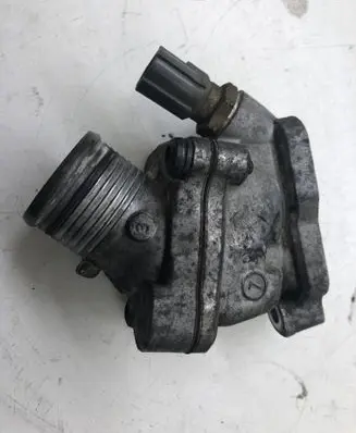 Thermostat/thermostat housing