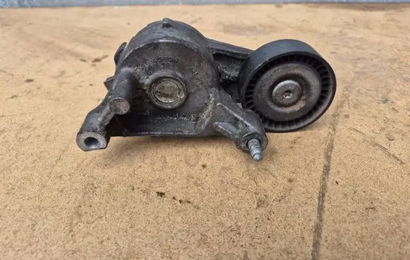 Volkswagen Touran I Generator/alternator belt tensioner 03G903315A